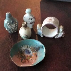 5 very pretty little pieces 2 mini bottles 1 small vase and plate & napkin ring.